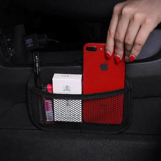 A compact black mesh net storage pouch with 3M adhesive backing for customizable placement in a vehicle