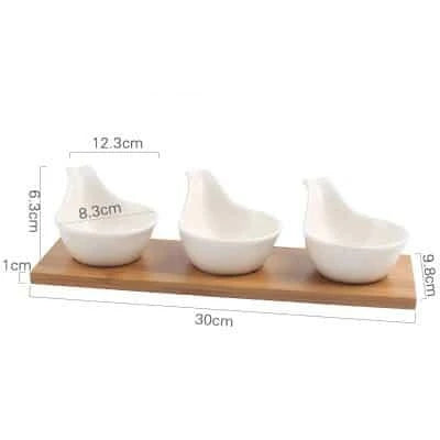 Stylish ceramic snack trays with natural wood pallet, perfect for serving nibbles and entertaining in Kiwi-style homes