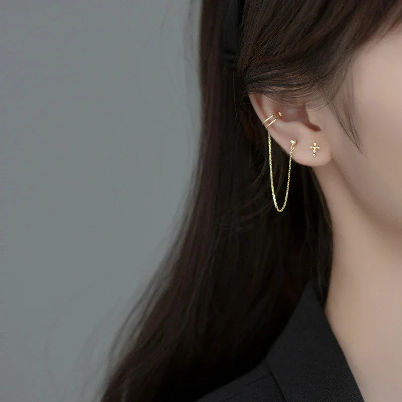 Unique one-piece sterling silver earring and ear clip set designed by New Zealand artist Xia Chunyin