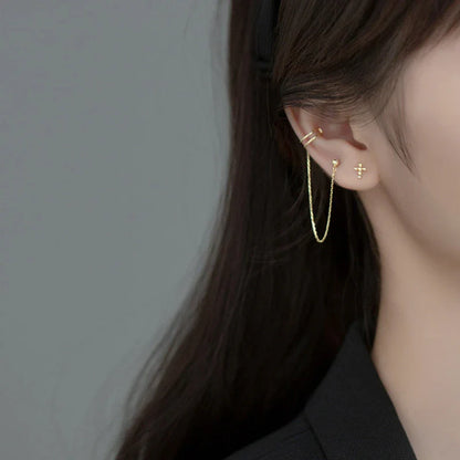 Unique one-piece sterling silver earring and ear clip set designed by New Zealand artist Xia Chunyin