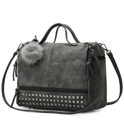 Stylish autumn pillow bag in matte PU leather with rivet detailing, ideal for Kiwi women's fashion