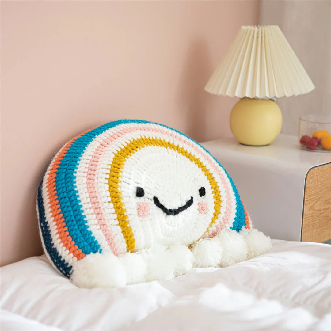 Cozy Cartoon Sunflower Cushion with Vibrant Rainbow Design and Cheerful Pompom Accents