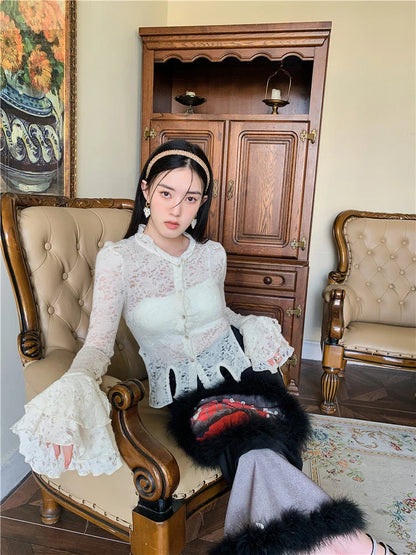 Lace patchwork shirt with ruffled sleeves in a beige color, perfect for casual and formal occasions