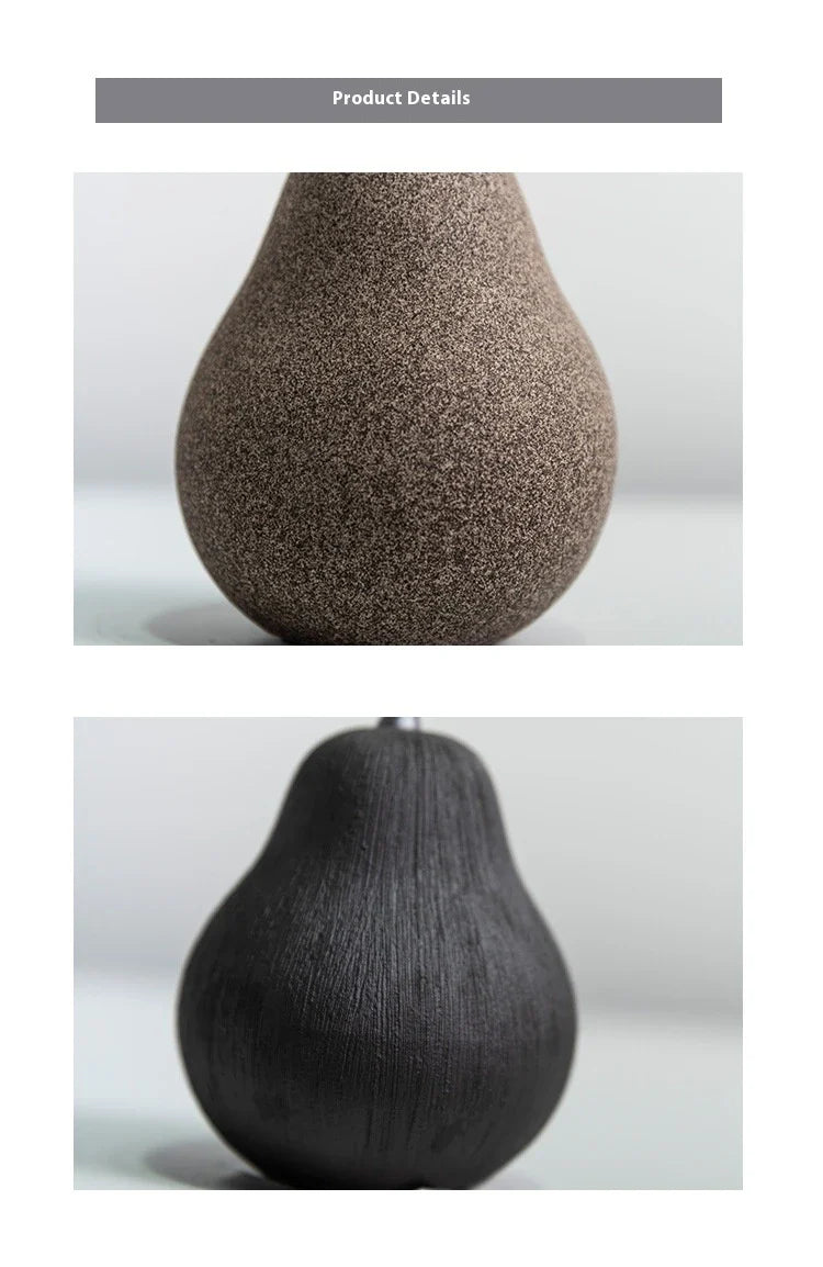 Handcrafted ceramic pear decoration with a sleek, modern design, perfect for adding a touch of natural elegance to any Kiwi home