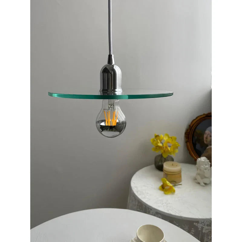 Elegant modern glass pendant light with a white shade, perfect for dining rooms, bedrooms, and other living spaces.