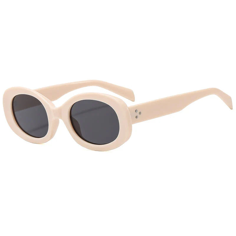 Stylish retro oval sunglasses with gradient lenses and a lightweight plastic frame, perfect for Kiwi adventures