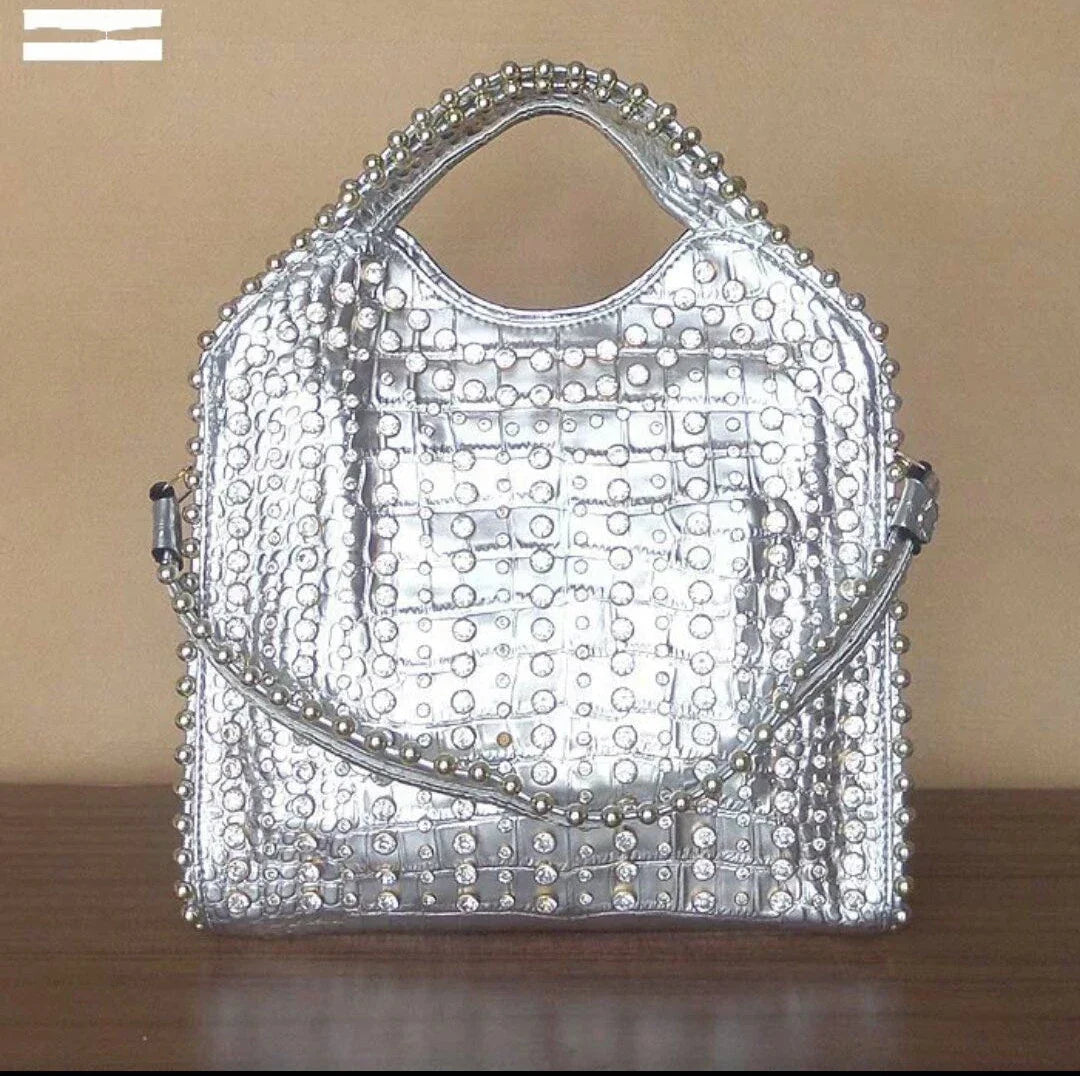 Stylish diamond-studded messenger bag with premium PU leather construction and sparkling rhinestones