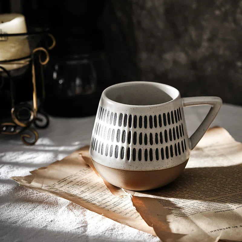 Stylish hand-painted ceramic mug with unique floral, geometric, or abstract designs, perfect for elevating your daily beverage experience.