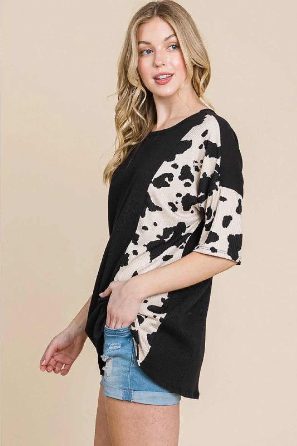 Stylish cow-print tee with ribbed fabric for Kiwi ladies, perfect for casual outings or night out with friends