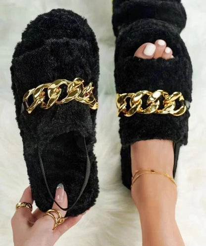 Leopard print plush slippers with metal chain accent, offering breathable comfort and stylish ethnic-inspired design.