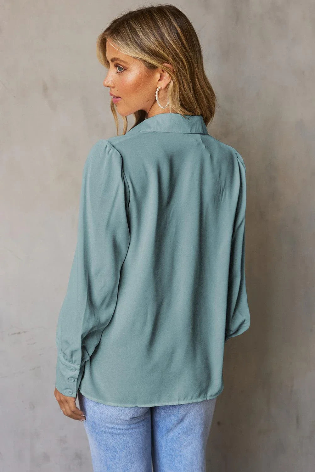 Gathered Detail Puff Sleeve Shirt in blue, featuring a collared neckline, buttoned front, and distinct puff sleeves for a timeless Kiwi style.