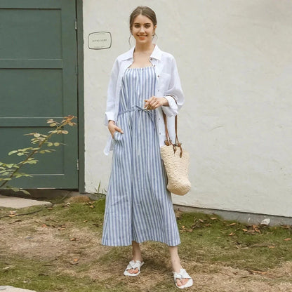 A stylish striped cotton linen maxi dress with an elegant A-line silhouette, perfect for summer in New Zealand.