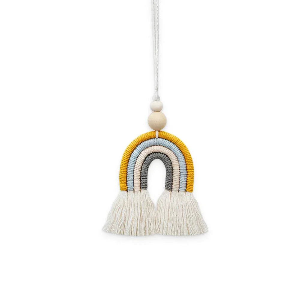 Bohemian Chic Cotton Rainbow Charm with wooden beads and cotton tassels, creating a warm, muted glow