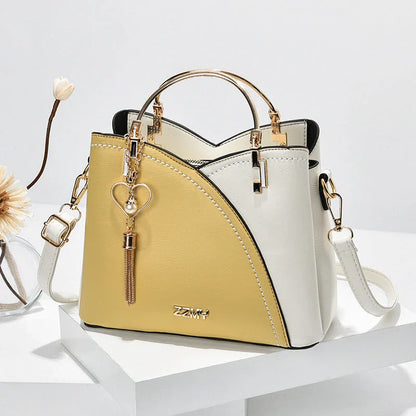 Stylish Color Block Crossbody Handbag with Trendy Tassel Accents made of premium PU leather for modern, on-the-go Kiwis