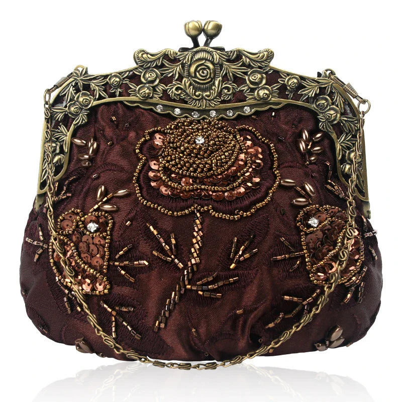 Bead embroidered fashion bag with silk surface, nylon exterior, and magnetic buckle closure