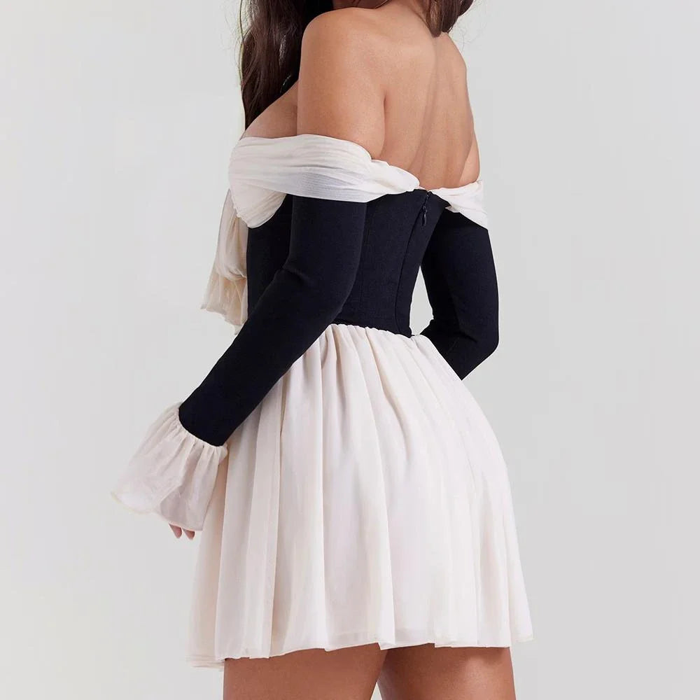 Stylish strapless backless mini dress with flared sleeves in a patchwork design, perfect for a night out in New Zealand