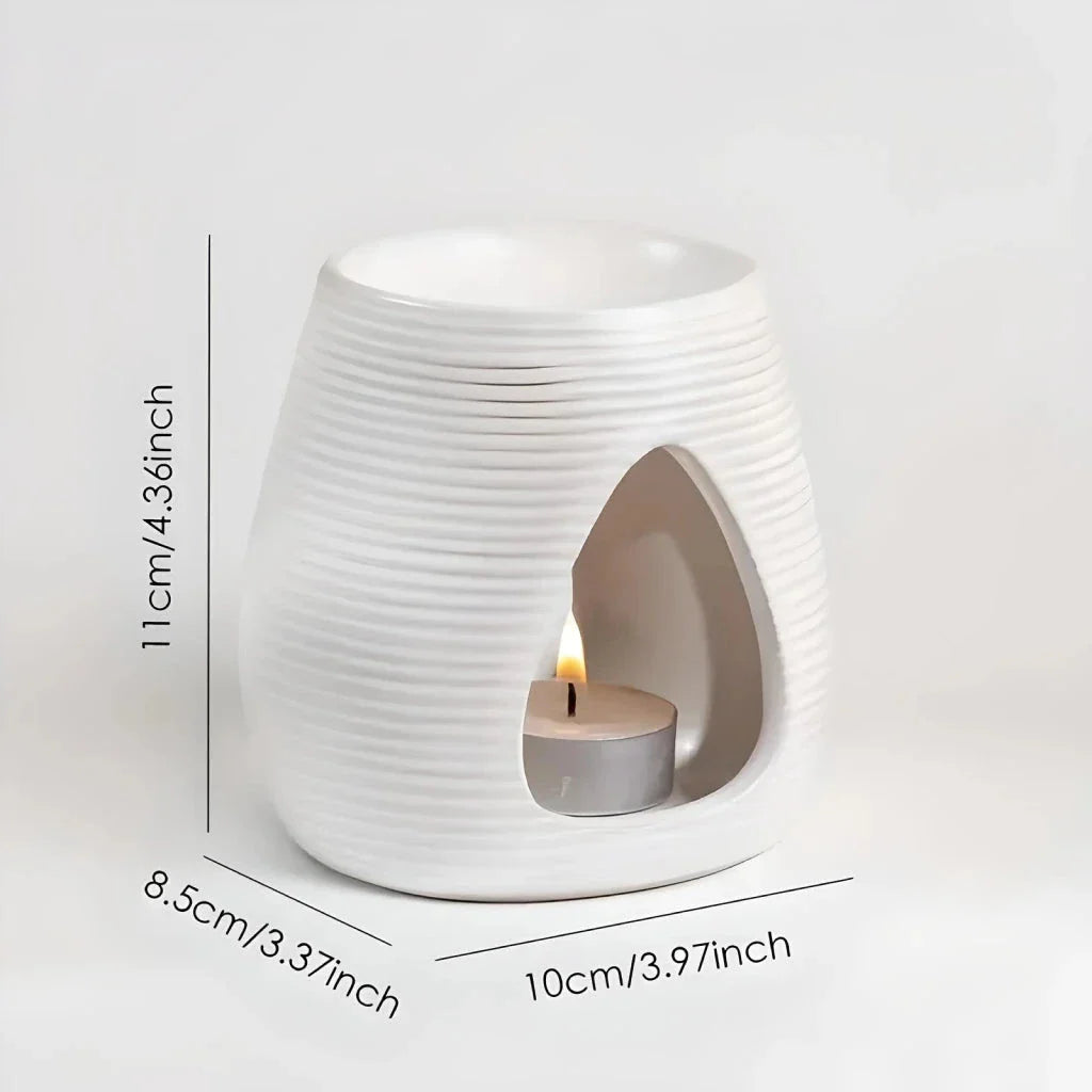 Elegant porcelain aroma diffuser in white and black colours, perfect for creating a relaxing atmosphere in your New Zealand home