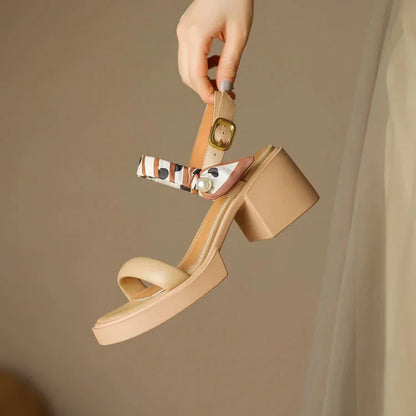 Chic open-toe leather platform sandals with adjustable buckle strap and square heel, perfect for Kiwi summer style.