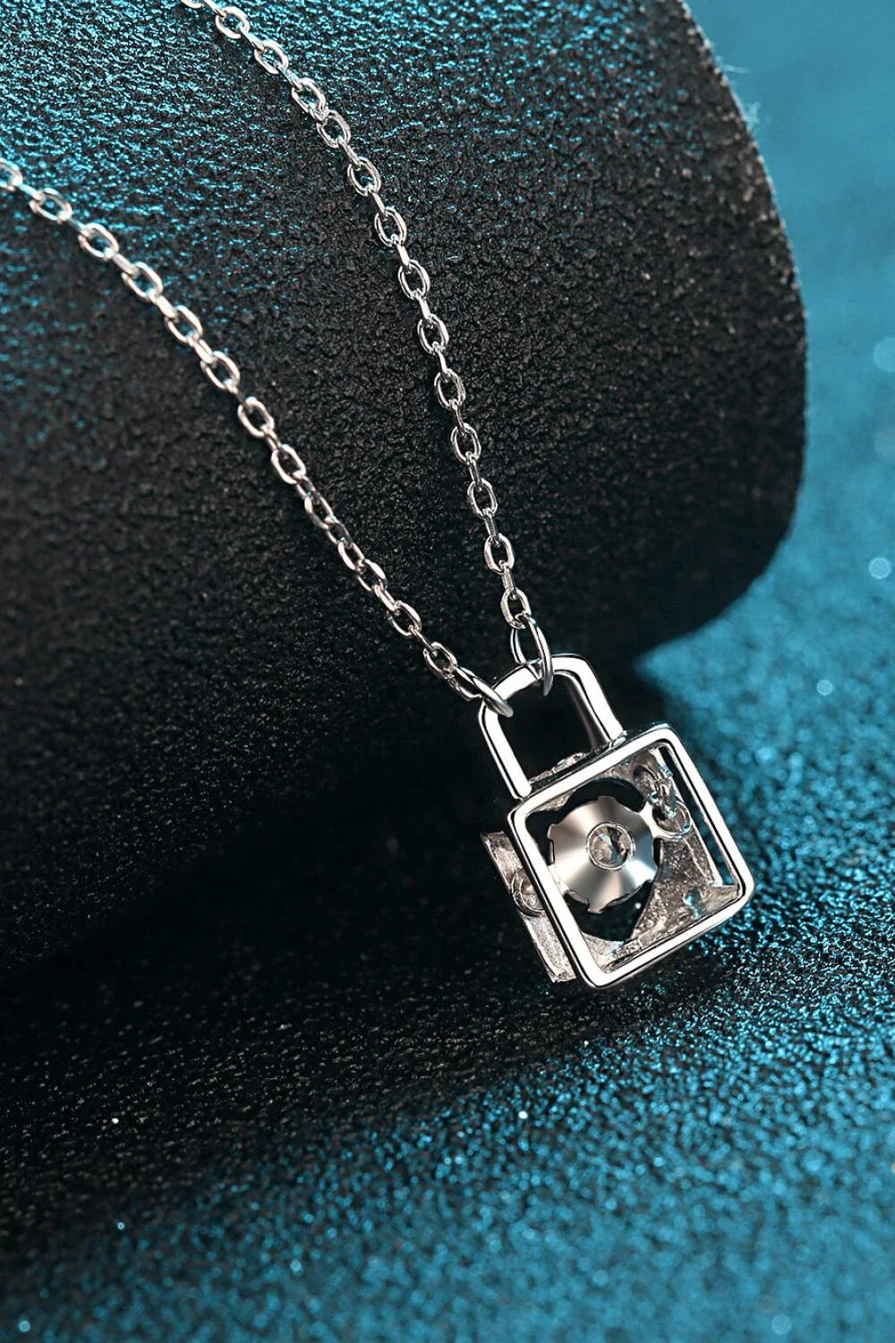 Elegant Moissanite Lock Pendant Necklace with 925 sterling silver, moissanite centre stone, and zircon accents