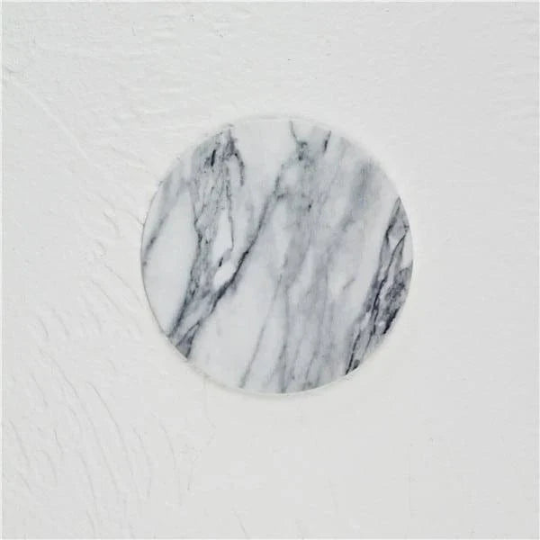 Stylish and practical marble-inspired silicone coasters for protecting surfaces in New Zealand homes