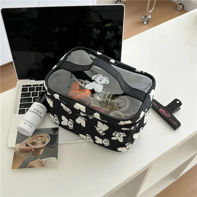 A stylish and durable dog grooming bag with a playful dog print design, perfect for Kiwi pet owners