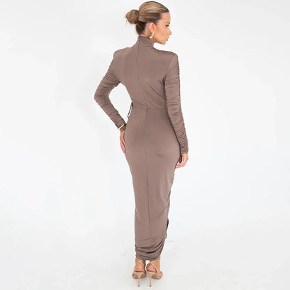 A stylish pleated dress with a drawstring waist and long sleeves, made from premium milk silk fabric in black or brown.