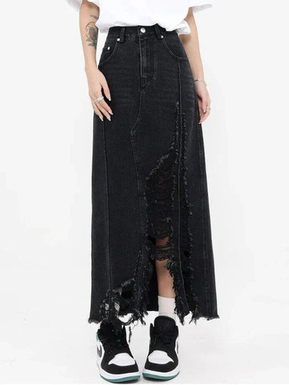 High-waisted denim skirt with unique pattern of holes and irregular burrs, made from premium cotton-polyester blend