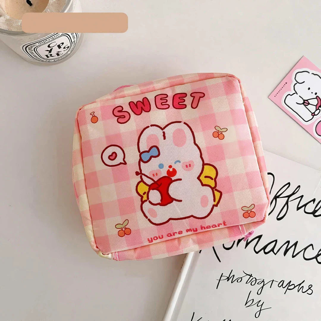 Adorable cartoon nylon cosmetic bag with a secure zipper closure and compact design, perfect for Kiwi consumers to organise their daily essentials.