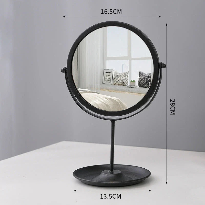 Elegant metal vanity mirror with polished silver mirror and built-in jewelry storage compartments