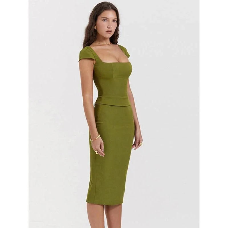 Stylish green two-piece set with square collar top and midi skirt, designed for women's fashion and special occasions.