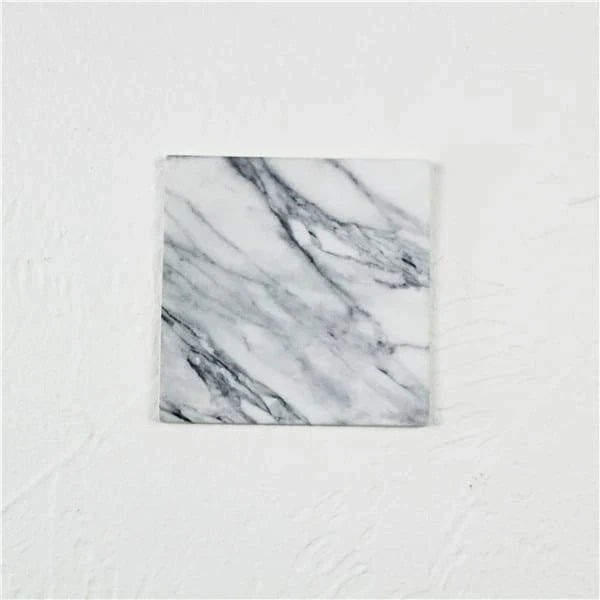 Stylish and practical marble-inspired silicone coasters for protecting surfaces in New Zealand homes