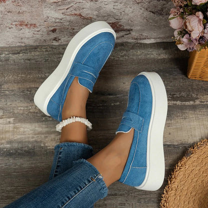 Women's casual platform loafers with a round toe design, slip-on construction, and a durable rubber sole for everyday comfort and style.