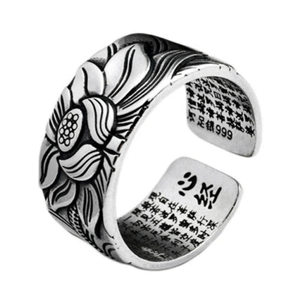 Vintage-style silver-plated Buddhism-inspired ring with lotus flower and Heart Sutra engraving, adjustable size for comfortable fit