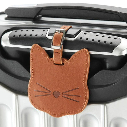 A green luggage tag featuring an adorable cartoon cat design, perfect for Kiwi travellers.