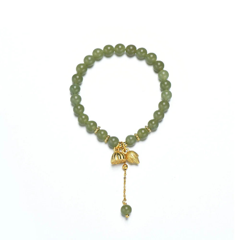 Handcrafted Hotian jade bracelet with a vintage-inspired floral design, a timeless Kiwi treasure