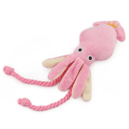 Cuddly pink squid-shaped plush toy for dogs, made of soft fleece material for snuggles and play