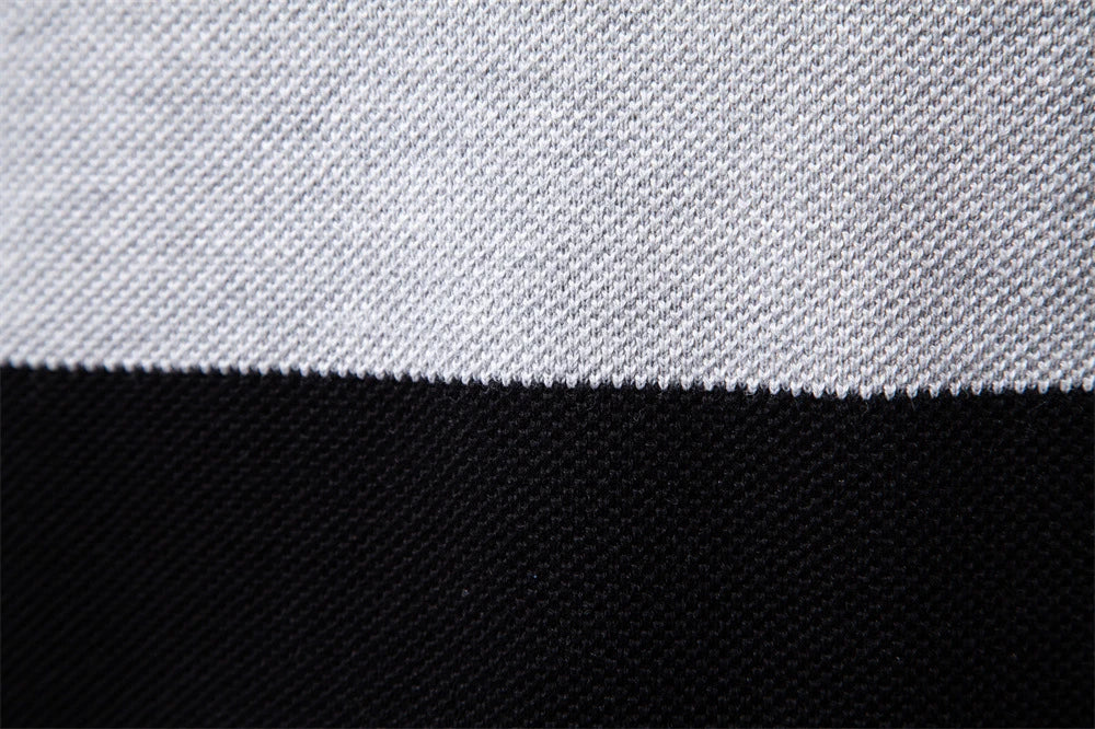 A stylish, slim-fit sweater in a modern colour-blocking design of Lake Green, White, and Grey, made with premium cotton for exceptional comfort and New Zealand casual style.