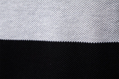 A stylish, slim-fit sweater in a modern colour-blocking design of Lake Green, White, and Grey, made with premium cotton for exceptional comfort and New Zealand casual style.