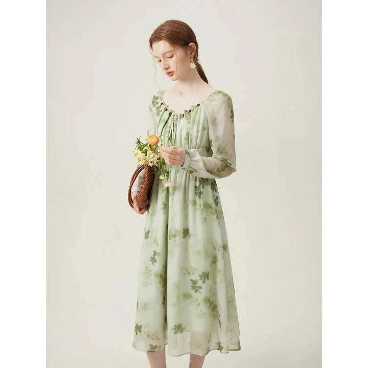 Elegant Kiwi-Inspired Romantic Dress with full-length sleeves, empire waistline, and A-line silhouette