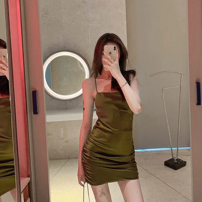 Retro-inspired sleeveless dress with suspender details, made from soft rabbit fur fabric in a range of colors.