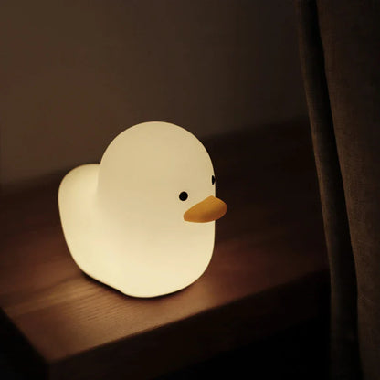 Enchanting Dull Duck LED Night Light with soft silicone body and customizable dimmable lights, perfect for bedrooms and kids' rooms