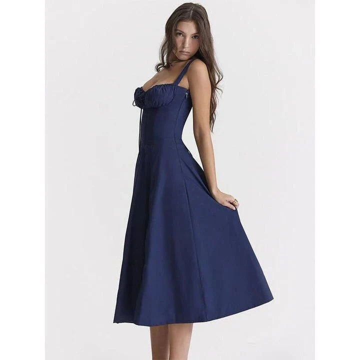 Elegant backless midi sundress in blue, featuring a high split and A-line silhouette for a flattering fit