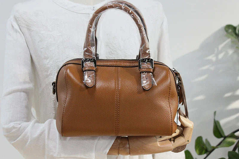 Classic leather shoulder bag in brown with a soft, pillowy shape and cotton lining for ultimate comfort and style