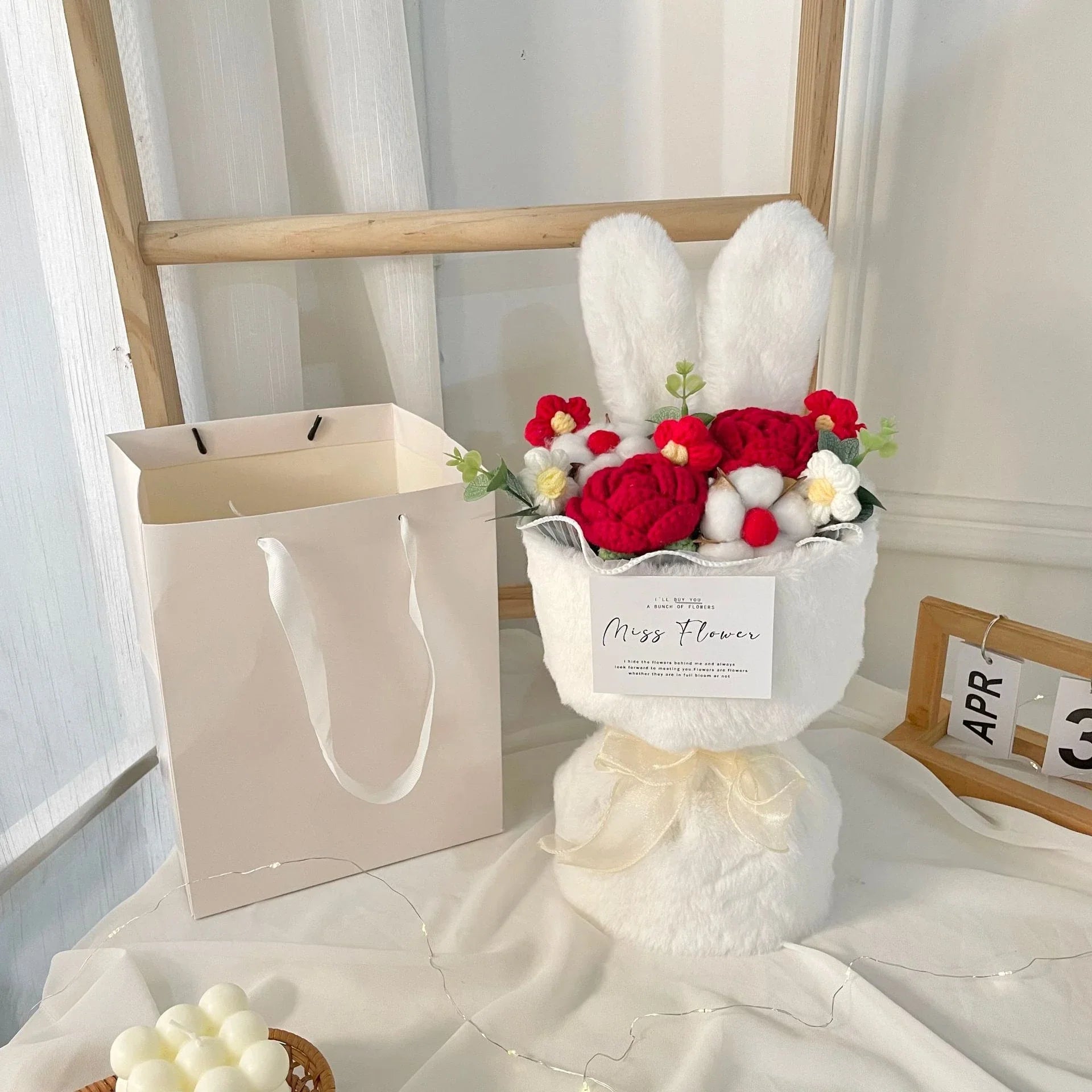 Creative knitted rabbit ear bouquet doll in vibrant colours, a unique and eco-friendly home accessory from New Zealand