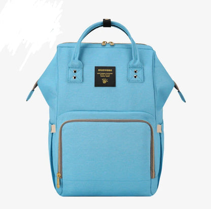 Stylish and practical mummy bag with reinforced handles, durable buckles, and separate bottling area for Kiwi mums