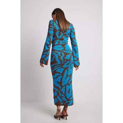 Elegant striped knit midi dress with O-neck design, featuring a flattering slim fit and comfortable ankle-length cut for the modern Kiwi woman.