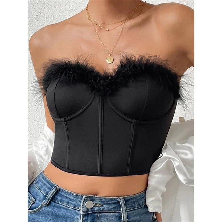 A stylish furry trim corset top in a flattering fit, perfect for adding a touch of glamour to any outfit.