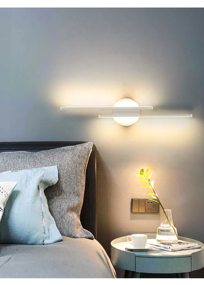 Stylish double linear LED wall light in black, creating warm and cosy ambience in a modern Kiwi home