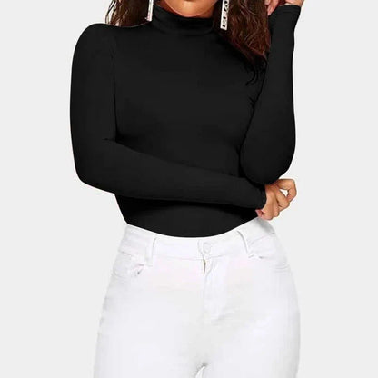 A cosy and stylish turtleneck top in a classic solid colour, perfect for layering and staying warm during the Kiwi autumn and winter seasons.