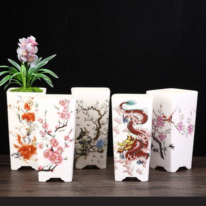 Stylish square ceramic planter in white, suitable for growing asparagus fern, orchids, and herbs on balconies or patios.